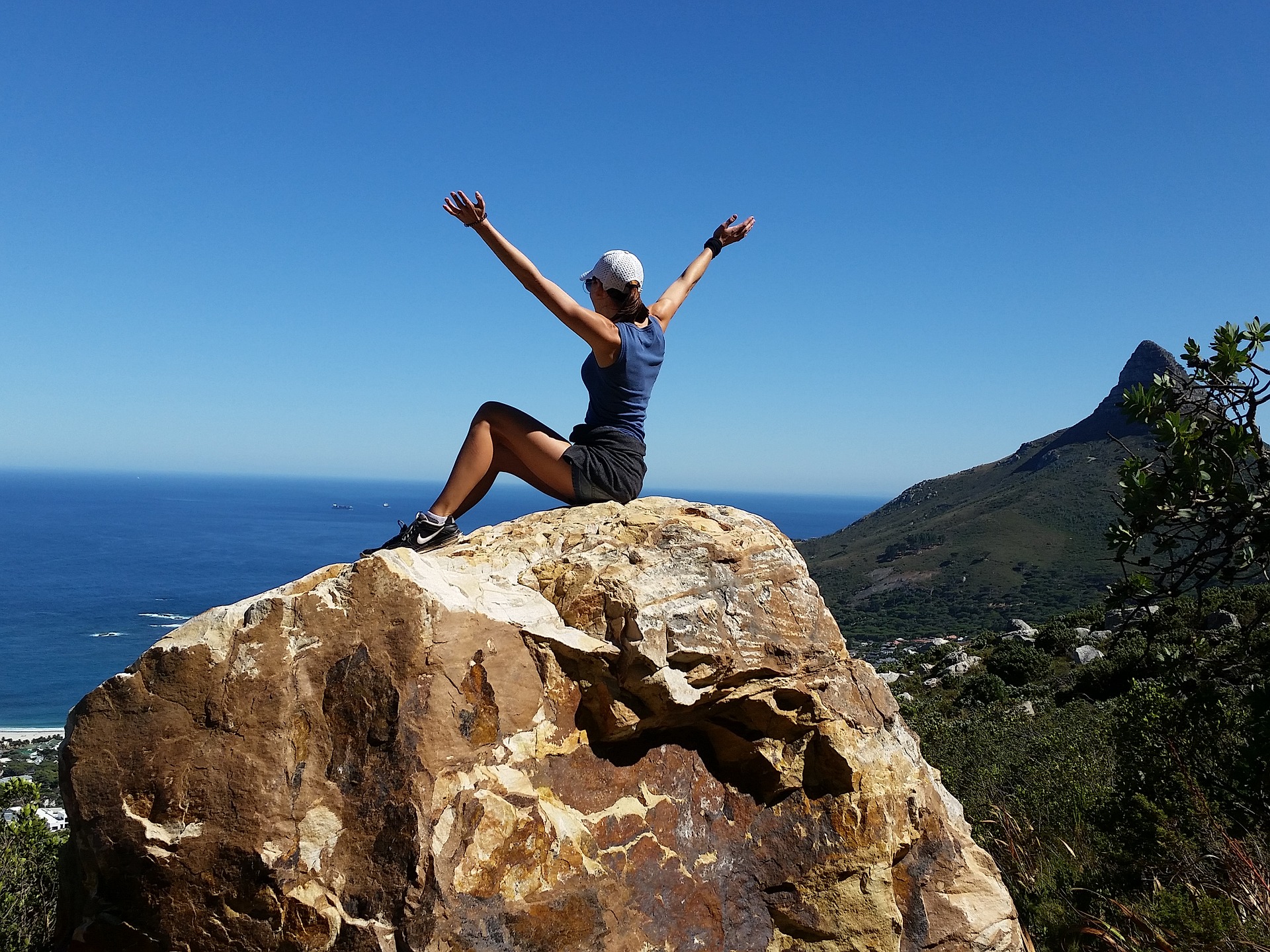 woman hiking summer rock 