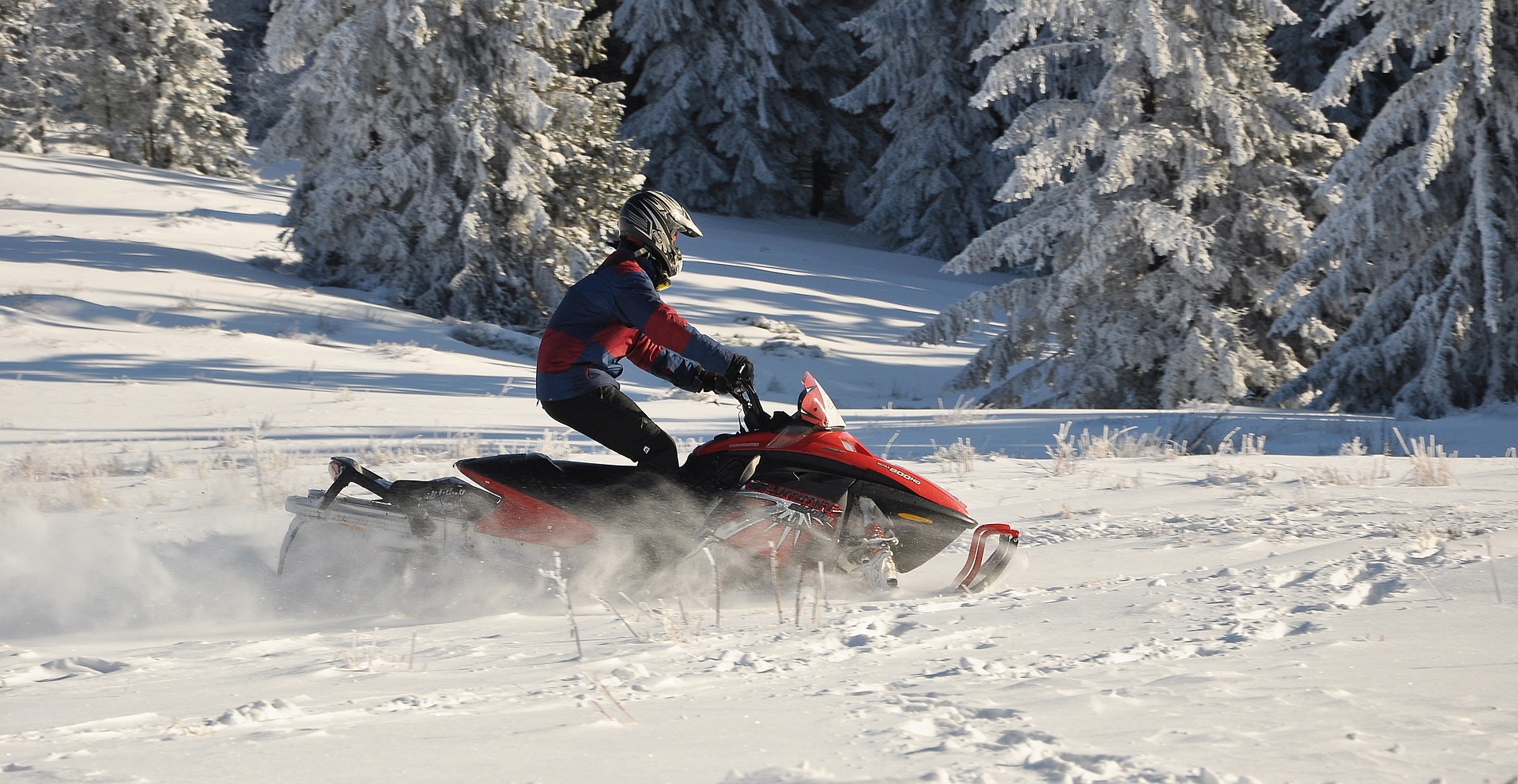 snowmobiling snow winter pixabay